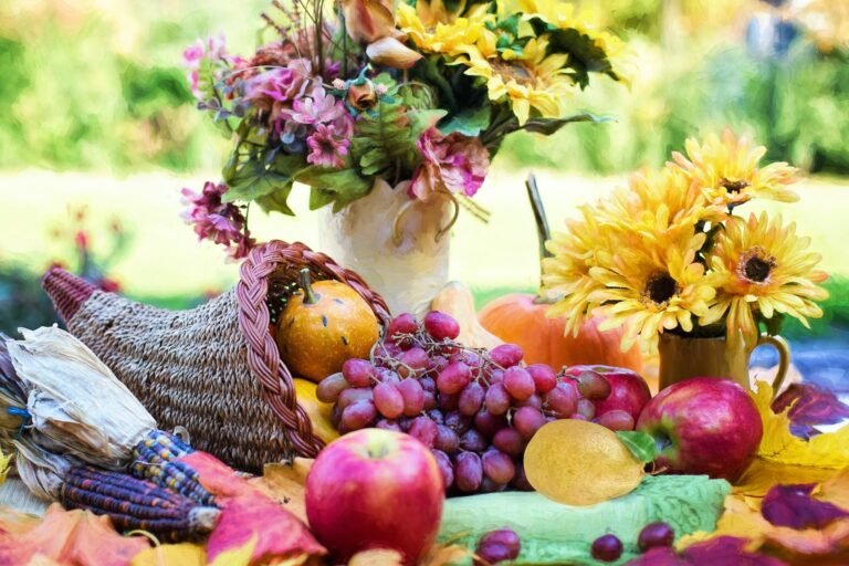 flowers and fruits on a table